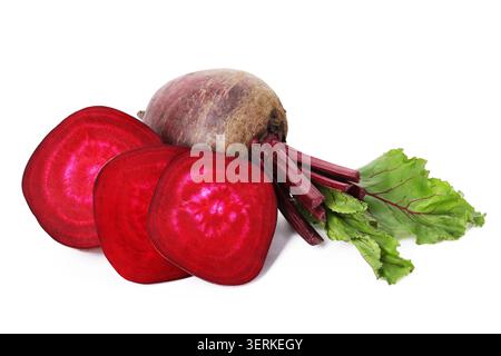 Whole and cut young beets with green leaves isolated on white Stock Photo