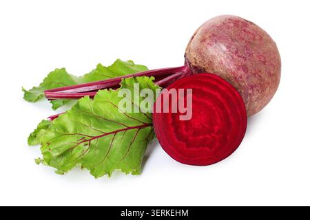 Whole and cut young beets with green leaves isolated on white Stock Photo