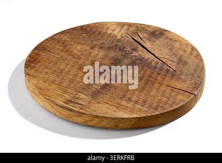 round rustic wooden cutting board with natural wood grain, cracks and aged texture isolated on a white background. Ideal for food presentation, produc Stock Photo