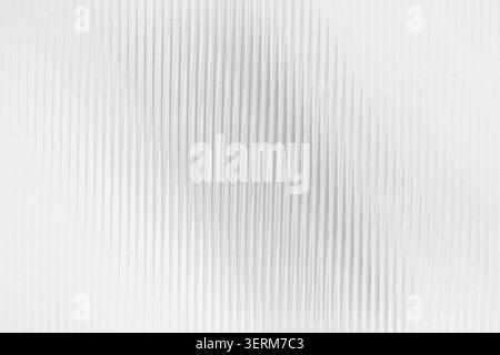 A clean, bright white background with subtle vertical textured lines and a light grainy effect, perfect for minimalist design projects. Stock Photo