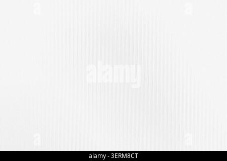 An abstract background featuring a series of very subtle, light grey vertical lines on a clean white background, creating a minimalist texture. Stock Photo