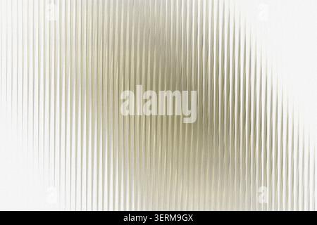 An abstract textured background featuring vertical ribbed lines with a subtle golden and white gradient effect. Stock Photo