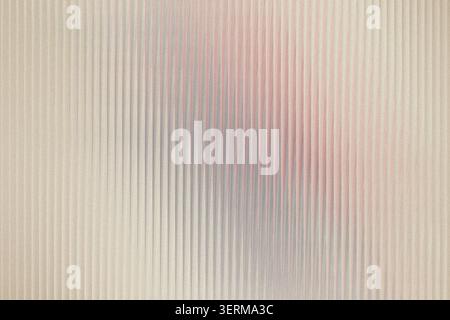 An abstract background with a vertical striped pattern, featuring a soft blend of muted pink, blue, and beige tones with a grainy texture. Stock Photo
