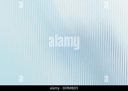 A minimalist abstract image showing a series of vertical ribs or lines creating a soft, light blue gradient effect with a subtle textured surface. Stock Photo