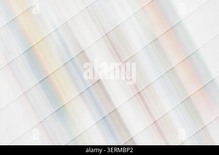 An abstract background featuring diagonal parallel lines with a colorful, soft gradient effect, creating a sense of movement and depth. Stock Photo