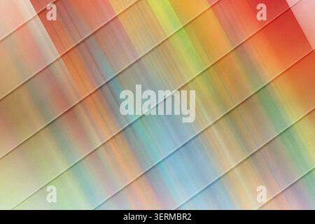 A vibrant abstract composition featuring diagonal stripes and a rich, multi-colored gradient with a textured, grainy finish. Stock Photo