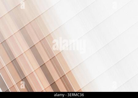 An abstract composition featuring diagonal stripes and soft brown color gradients, creating a modern and minimalist textured pattern. Stock Photo
