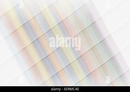A minimalist abstract background featuring diagonal stripes in soft, muted pastel tones with a subtle grainy texture and light overlay. Stock Photo