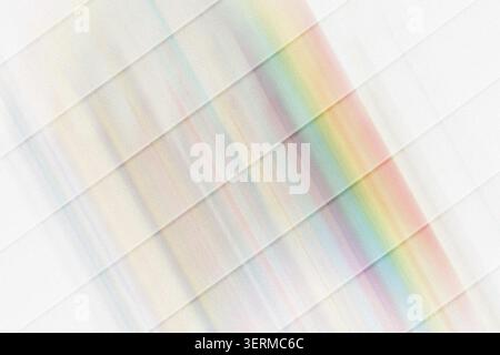 Abstract background featuring diagonal parallel stripes with a soft rainbow light refraction effect, creating a modern and clean aesthetic. Stock Photo