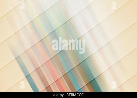 An abstract composition featuring diagonal lines overlaid with vibrant, multi-colored vertical streaks, creating a dynamic and artistic visual effect. Stock Photo
