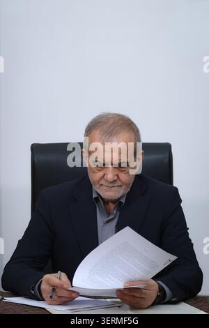 Tehran, Iran. 18th June, 2026. Iran's President Masoud Pezeshkian signing a memorandum of understanding in Tehran on June 18, 2026. US President Donald Trump and Iranian President Masoud Pezeshkian signed a memorandum of understanding early on Thursdy on June 18, ending a regional war that erupted on February 28 with US-Israeli strikes. Photo by Iranian Presidency/UPI Credit: UPI/Alamy Live News Stock Photo