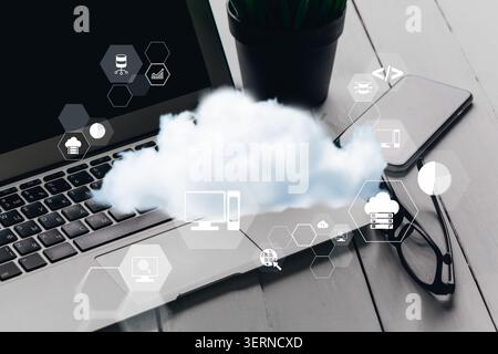 Cloud computing concepts and tools for business management with laptop and mobile device Stock Photo