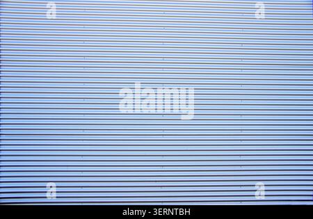 wrought iron gate in blue as concept of closed store Stock Photo