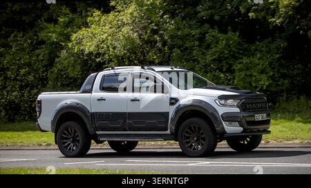 Milton Keynes,Bucks,UK - June 18th 2026:  2017 white Ford Ranger pickup truck car driving on a British road Stock Photo