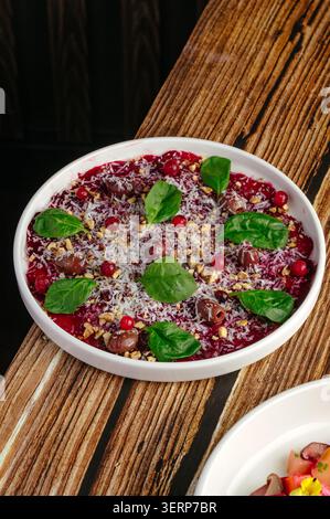 Gourmet beetroot salad on a rustic table Stock Photo
