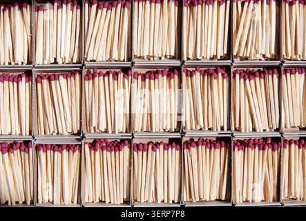 Many boxes with matches. Open match boxes background. Stock Photo