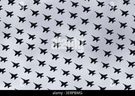 Repeating pattern of fighter jet silhouettes Stock Photo
