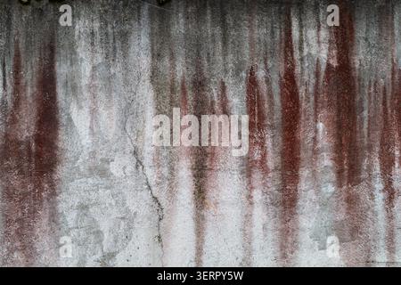 Distressed Concrete Texture with Red-Brown Moisture Streaks Stock Photo