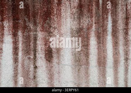 Distressed Concrete Texture with Red-Brown Moisture Streaks Stock Photo