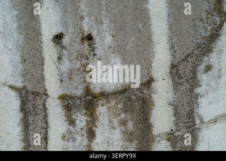 Industrial Grunge Texture Featuring Weathered Concrete Surface creating a sad smiling face Stock Photo