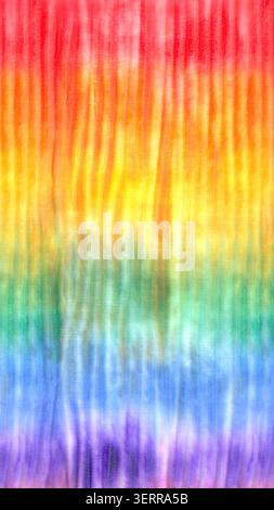 Hand painted watercolor tie dye background featuring rainbow colors and soft vertical texture. Artistic abstract backdrop for digital design, statione Stock Photo