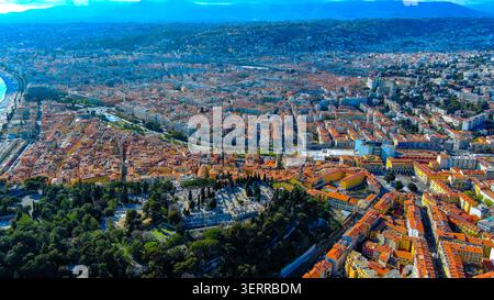 Aerial drone view of Nice cityscape with Vieux Nice rooftops, Parc du Château and Promenade des Anglais coast, France Stock Photo
