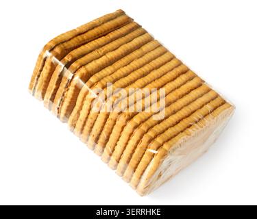 Cookies in transparent plastic packaging on a white background. Close-up of a pack of cookies. Stock Photo