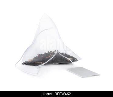 One tea bag with tag isolated on white Stock Photo