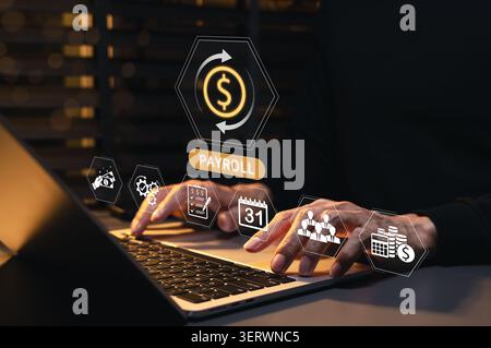 Payroll management system and employee salary processing concept. professional using laptop with virtual payroll, money transfer, calendar, invoice, Stock Photo