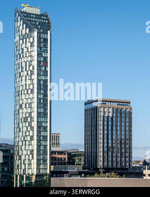The West Tower is a 40 story combination office and apartment building in Liverpool, England, It was  completed in 2007. The smaller building in INNSi Stock Photo