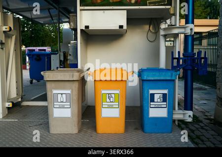Recycling bins in row Stock Photo