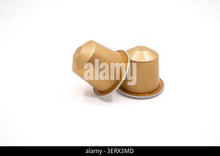 Espresso Capsules in White Background. Stock Photo