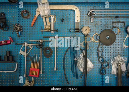 Car repair shop tool set on perforated panel. Stock Photo