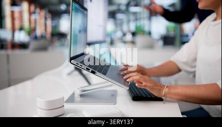 Two Employees Secretly Transferring Confidential Data Using Office Computers. Stock Photo