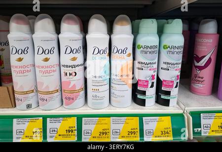 VORONEZH, Russia - March 6, 2026.Multiple spray deodorants from Dove and Garnier Mineral are arranged on a supermarket shelf in Russia. Each product h Stock Photo