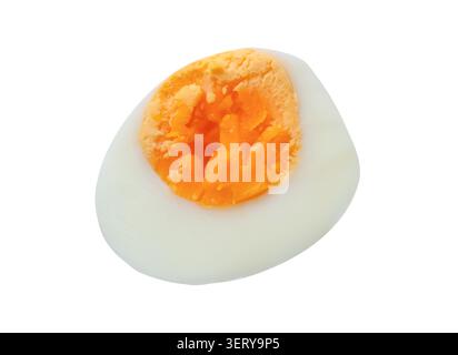 Unpeeled cooked or boiled egg with egg yolk in half is isolated on white background with clipping path. Stock Photo
