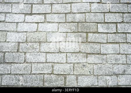 Texture of light gray granite cobblestone pavement Stock Photo