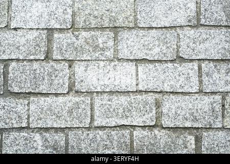 Texture of light gray granite cobblestone pavement Stock Photo