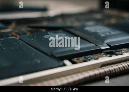 Intricate CloseUp View of Laptop Components Featuring Battery and Circuit Board Elements Stock Photo