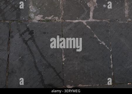 ABSTRACT BACKGROUND TEXTURE OLD CRACKED ASPHALT PAVEMENT Stock Photo