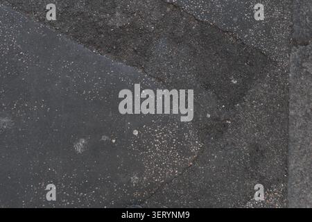ABSTRACT BACKGROUND TEXTURE OLD CRACKED ASPHALT PAVEMENT Stock Photo