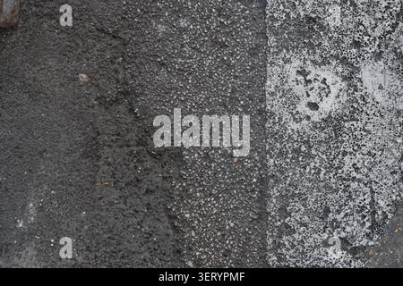 ABSTRACT BACKGROUND TEXTURE OLD CRACKED ASPHALT PAVEMENT Stock Photo