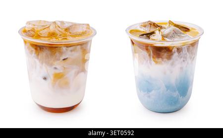 Two different cold iced coffee drinks stand on white background. Refreshing summer beverages feature beautiful milk swirls and thick blue matcha layer. Stock Photo