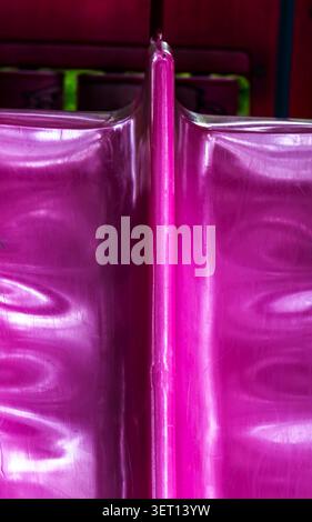 A close up view of the top of a slide in a children's playground Stock Photo
