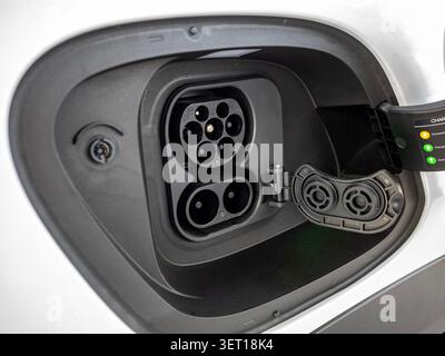 Close-Up of Electric Vehicle EV Charging Port with CCS Type 2 Inlet Stock Photo