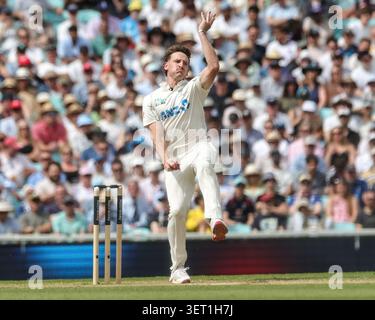 New Zealand bowler Nathan Smith, right, gestures to India's Shreyas ...