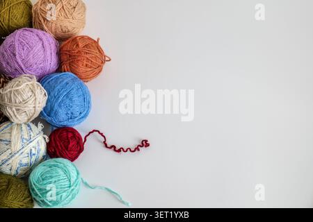 Colorful Yarn Balls on White Background Stock Photo