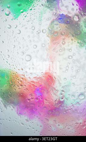 Digital wallpaper with an abstract pattern of water drops on a multicolorued background. High quality photo Stock Photo