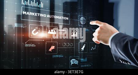 Marketing automation platform for business workflow optimization with interactive digital interface and human hand Stock Photo