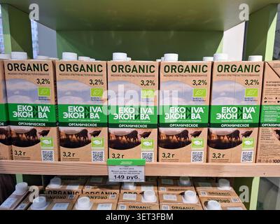 VORONEZH, Russia - March 3, 2026.Cartons of Ekoniva brand organic ultra pasteurized milk are lined up on a store shelf in Russia. Each carton shows th Stock Photo